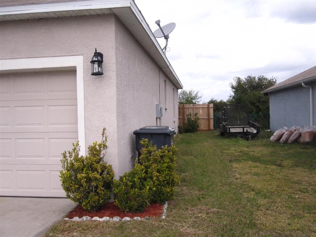 a house with a satellite on the side of it