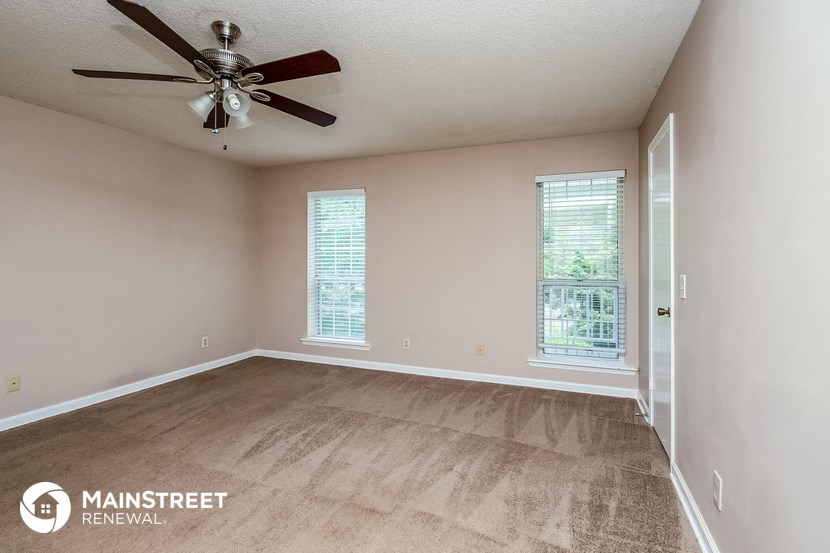 the spacious living room is clean and ready for you to use