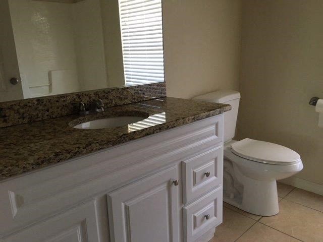 a bathroom with a sink and a toilet