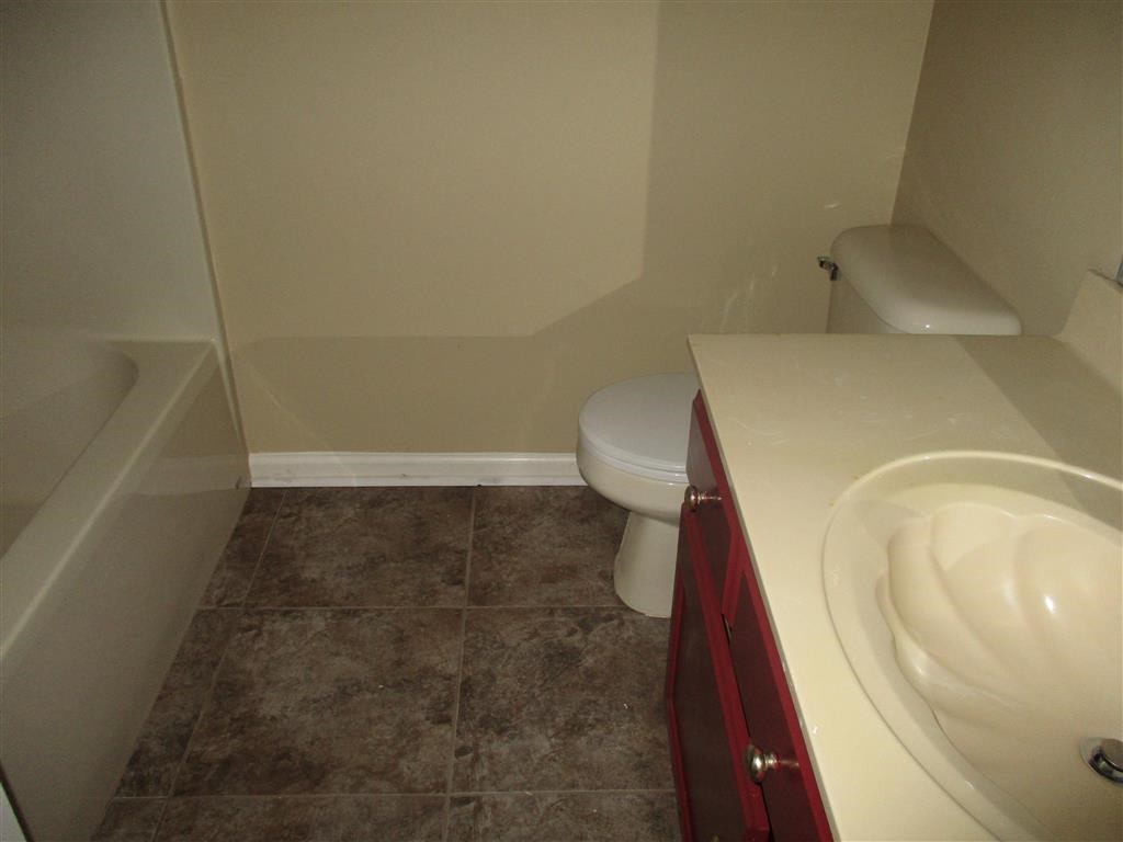 a small bathroom with a toilet and a sink