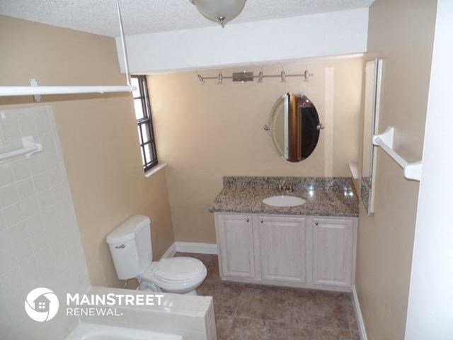 a small bathroom with a toilet and a sink