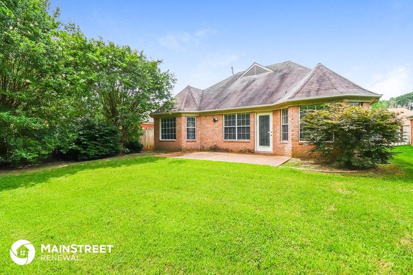 a home with a yard and a lawn