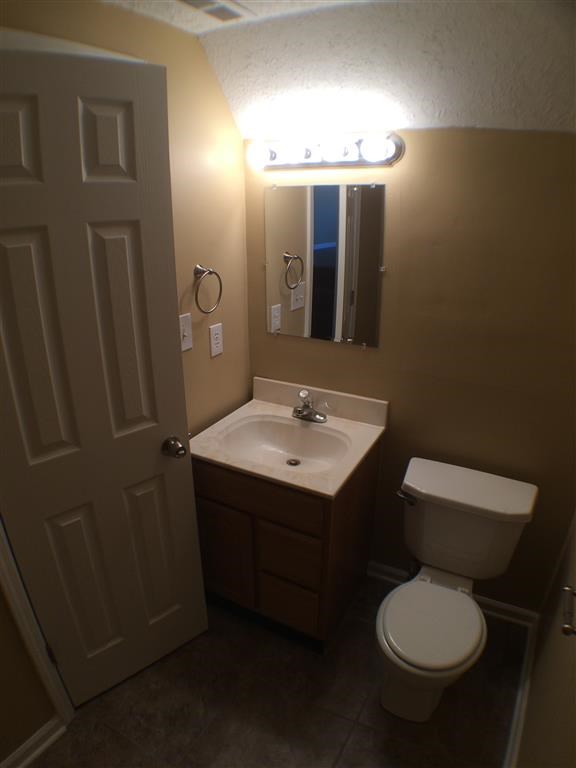 a small bathroom with a toilet and a sink