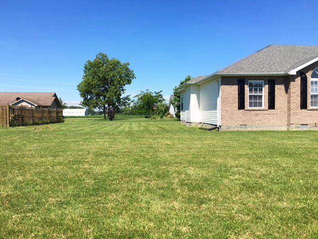 a house with a yard in front of it