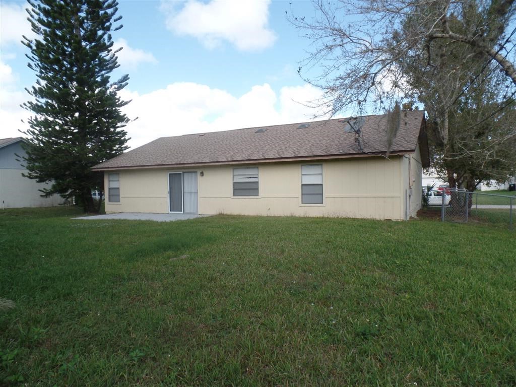 a house with a yard in front of it