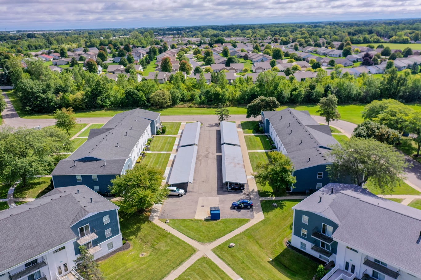an aerial view of a group of houses in a neighborhood