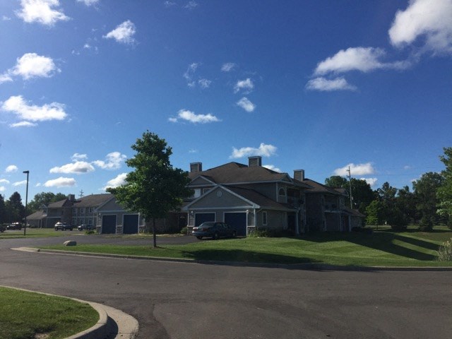a large house on the corner of a street