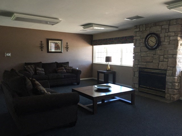 a living room with couches and a coffee table