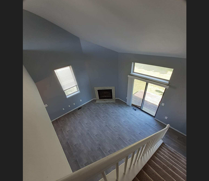 a view of the living room from the stairs