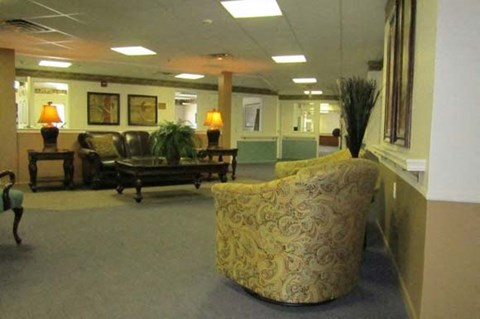 a living room with a couch and a table