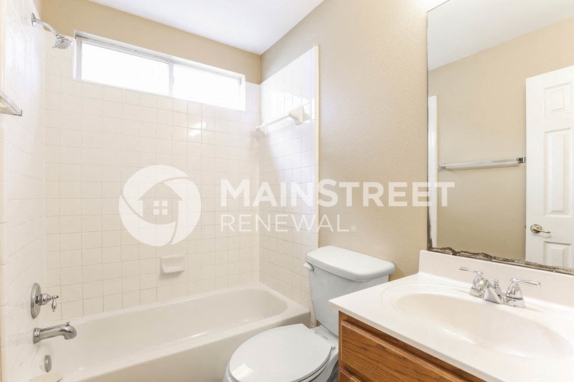 a small bathroom with a toilet and a sink