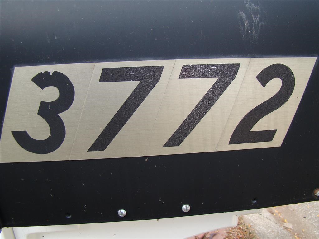 a street sign with the number 3727 on it