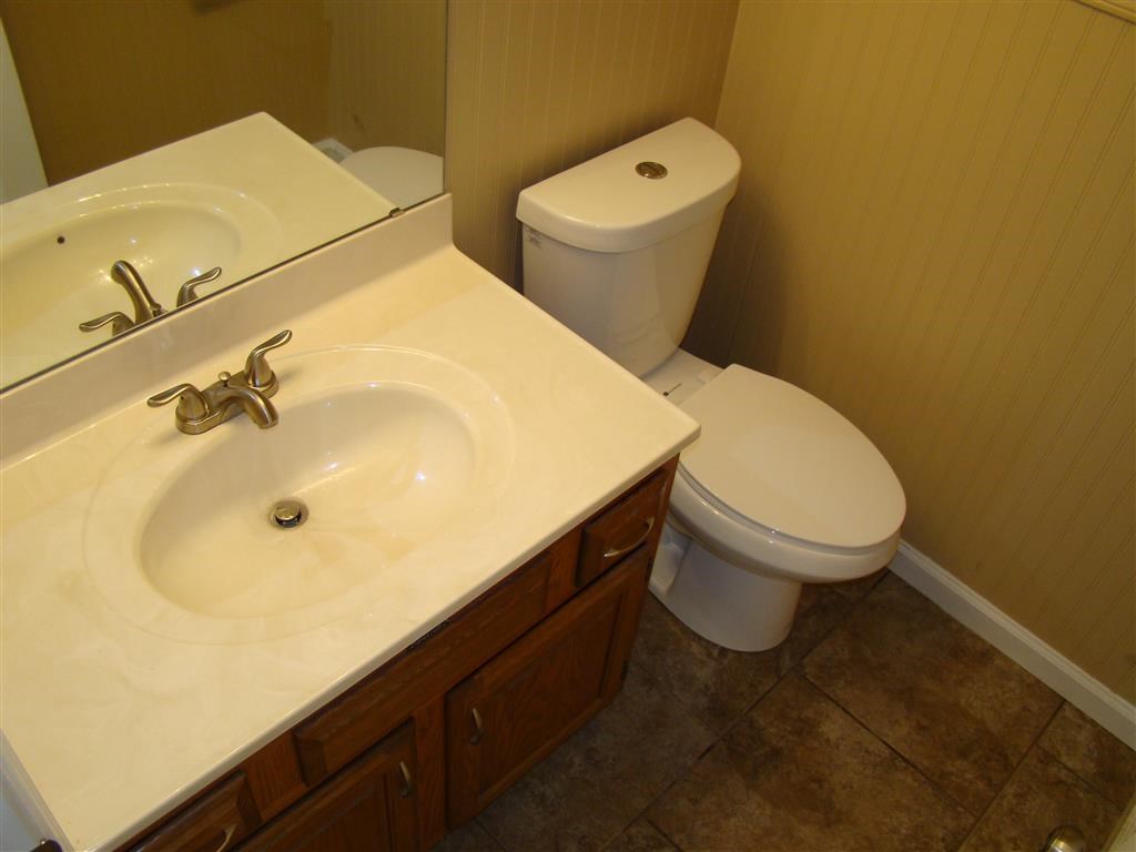 a bathroom with a sink and a toilet