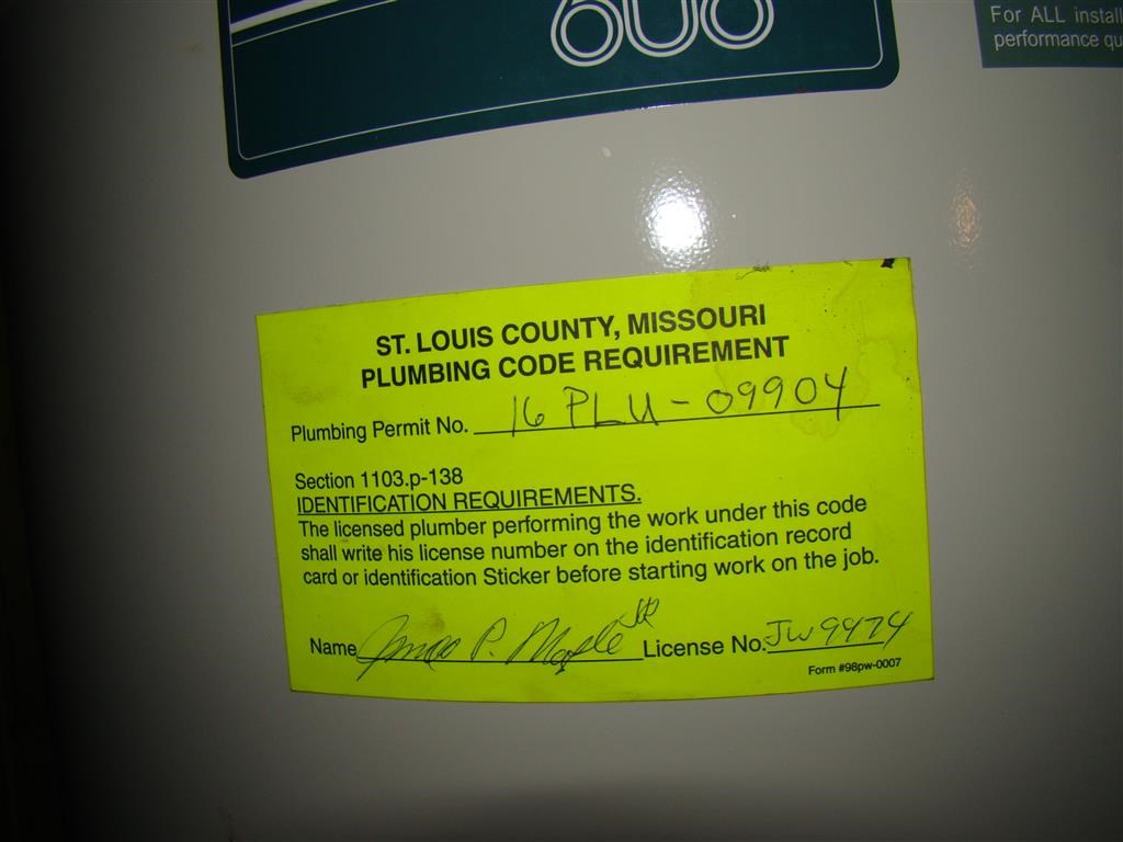 a sticker on the door of a washing machine