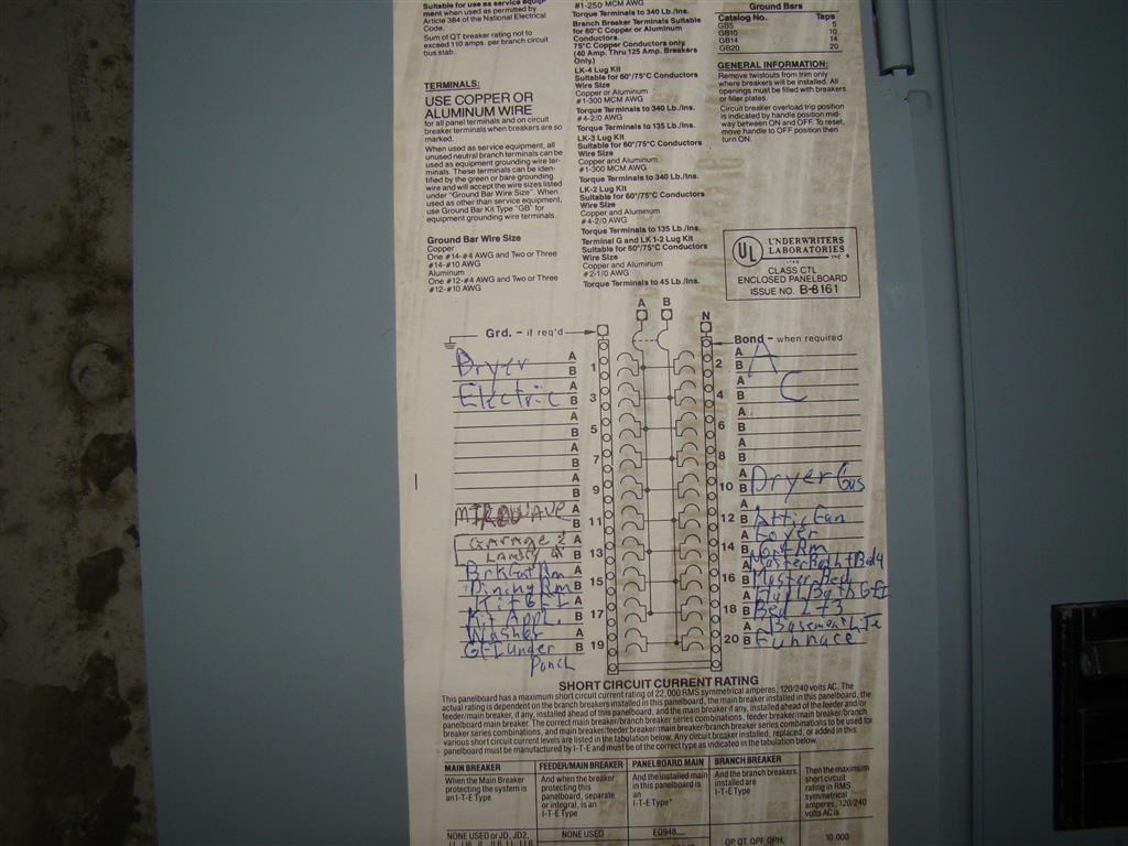 a piece of paper sitting next to a refrigerator