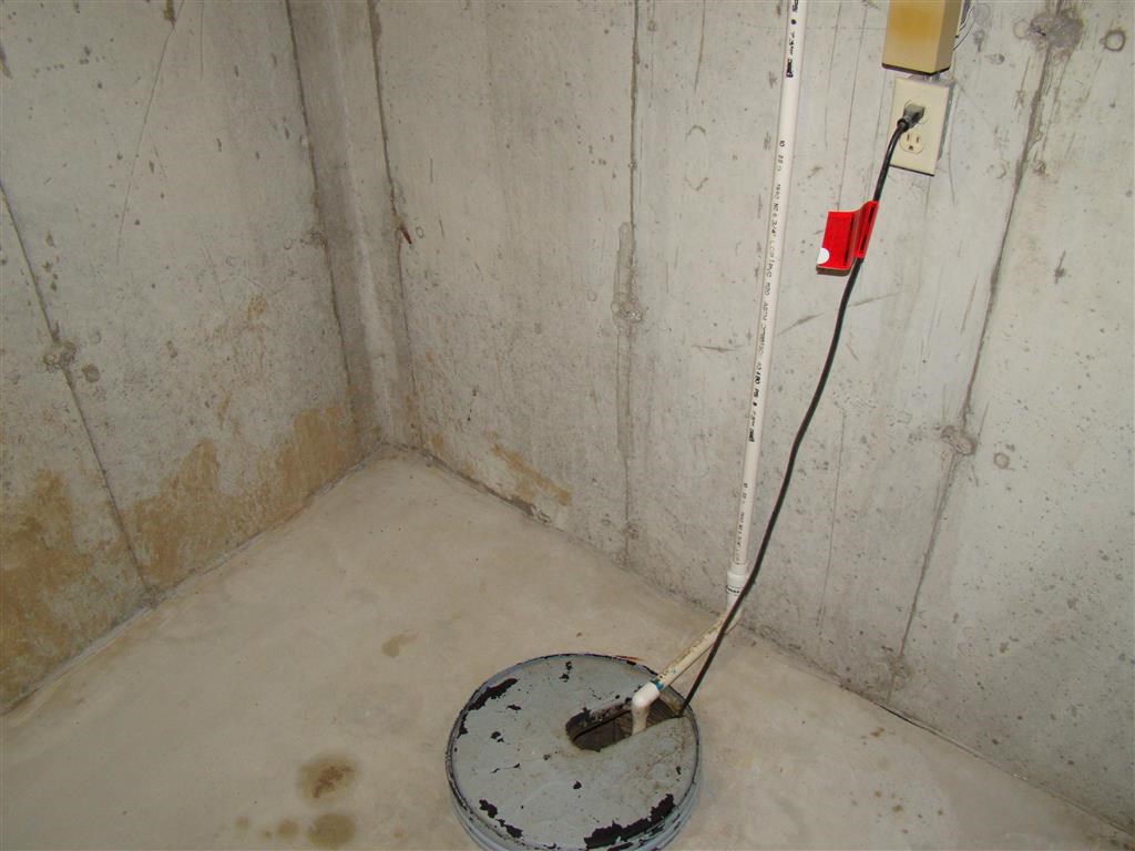 a mop in the corner of a room