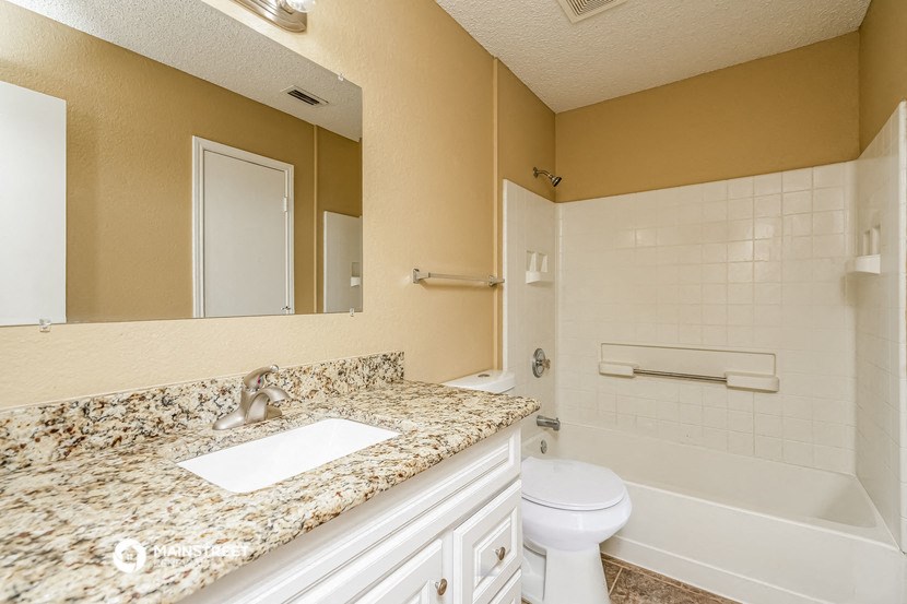 a bathroom with a sink and a toilet