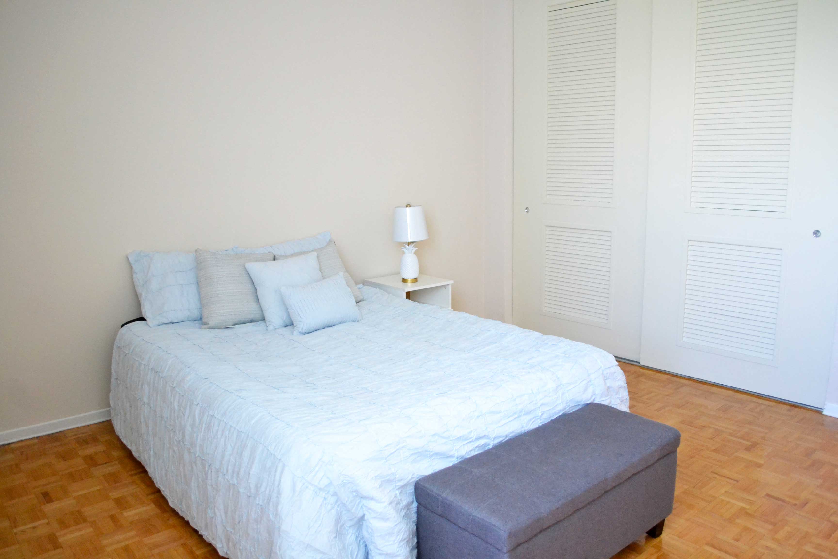 a bedroom with a large bed and a