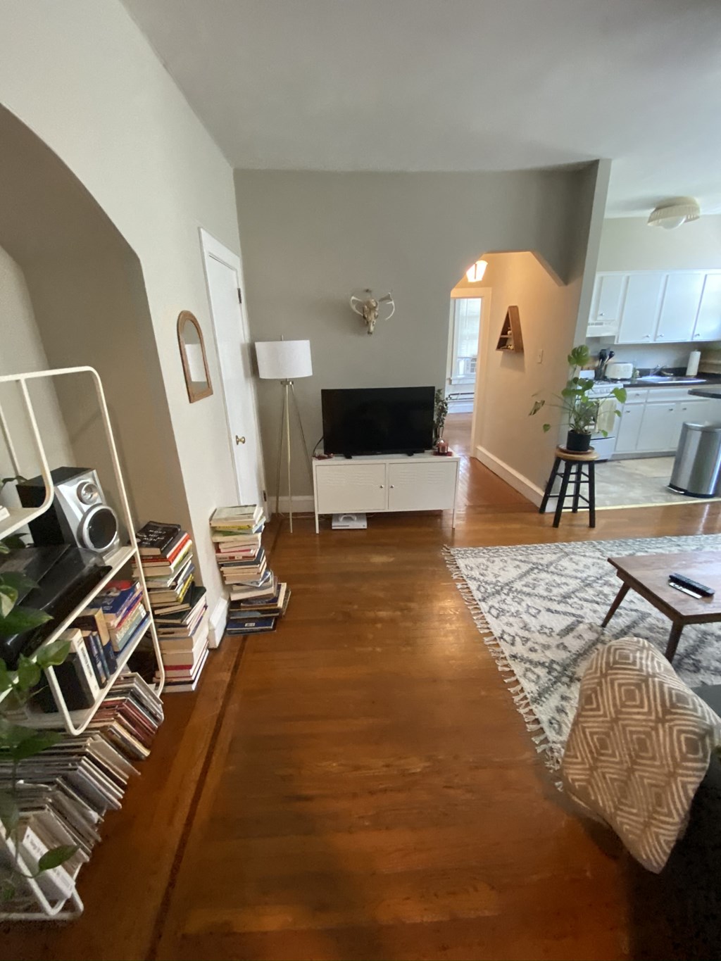 a living room with a couch and a tv