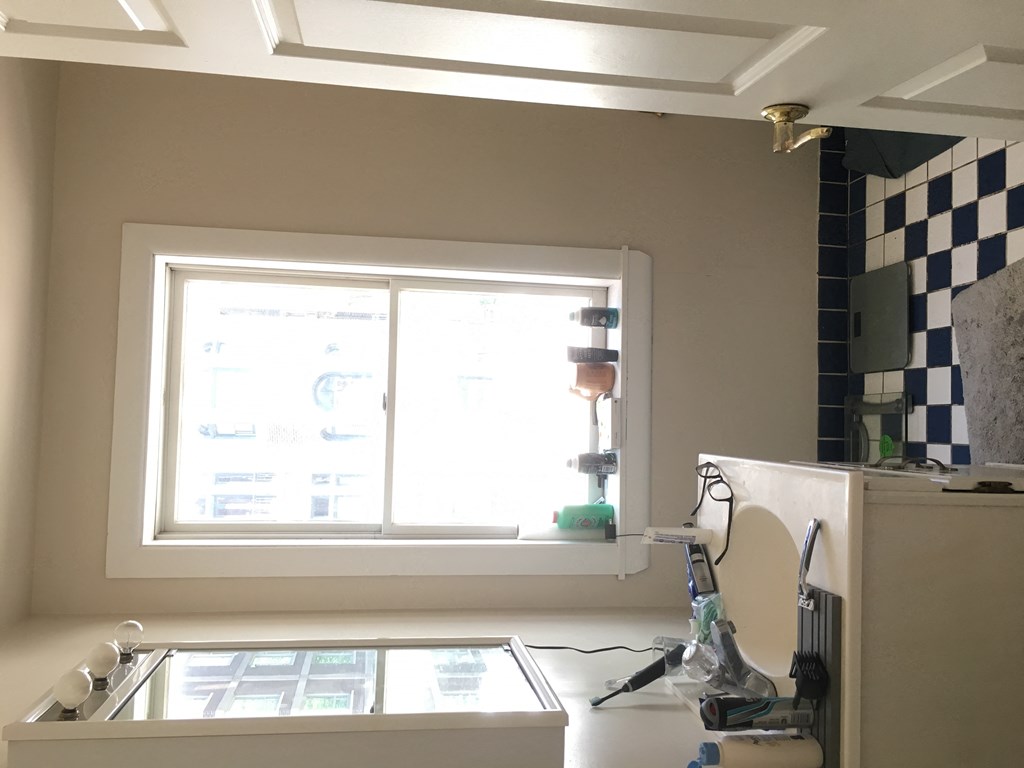 a kitchen with a sink and a window