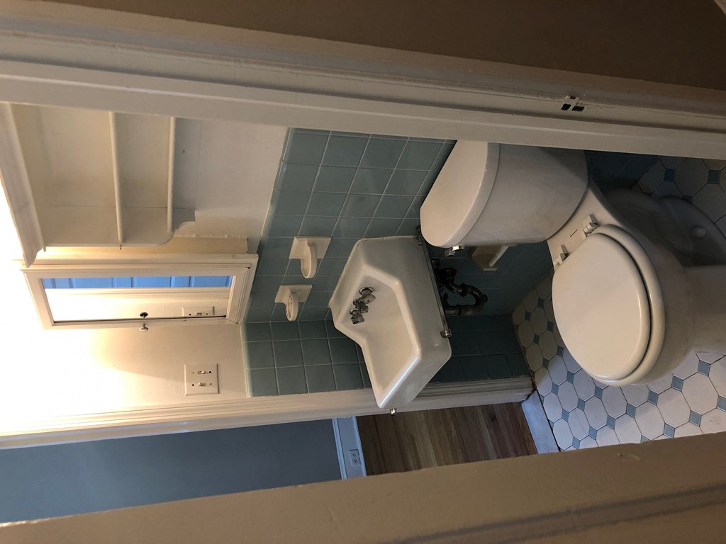 a model of a bathroom with a toilet and sink