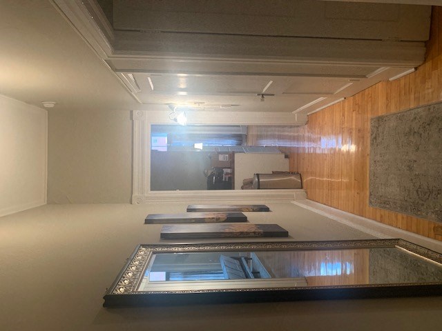 an empty room with a table and a window