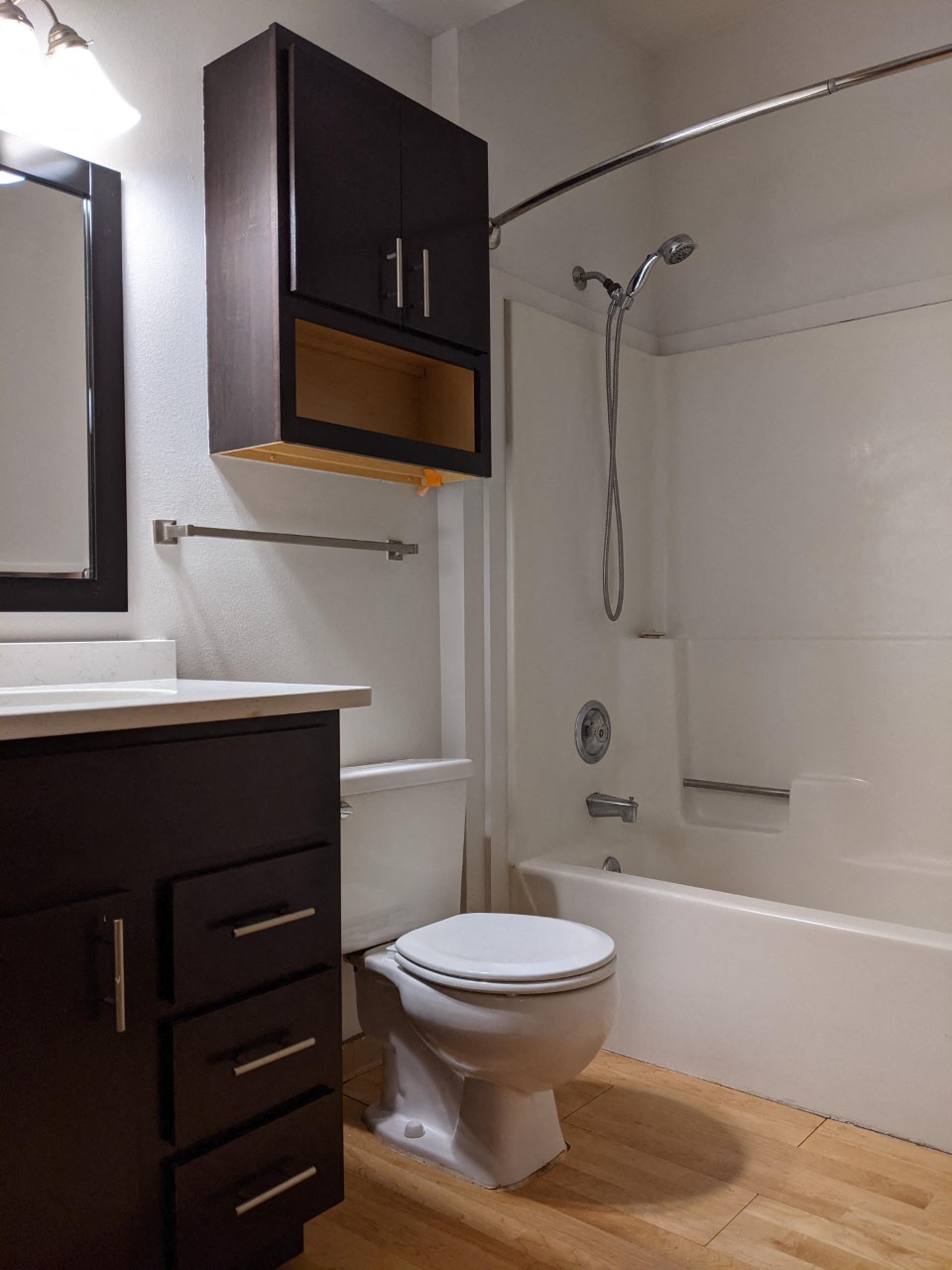 a small bathroom with a toilet and a shower