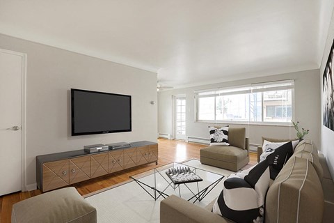 a living room with a couch and a television