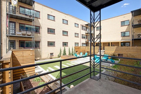 our apartments have a large yard with a pool