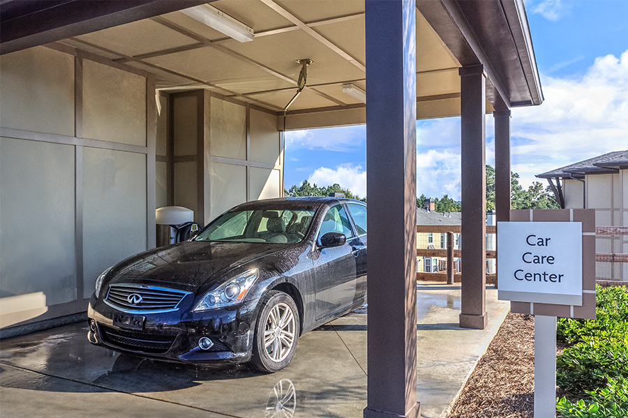 Suwanee apartments near Oracle - Artisan Station Apartments car care center