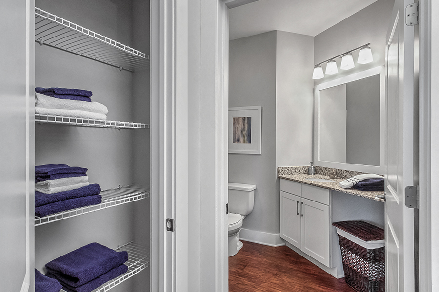 Adams Creek apartments near Mall of Georgia - Artisan Station Apartments linen closet
