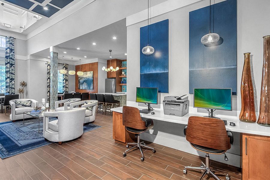 Adams Creek apartments near Mall of Georgia - Artisan Station Apartments Wi-Fi lounge