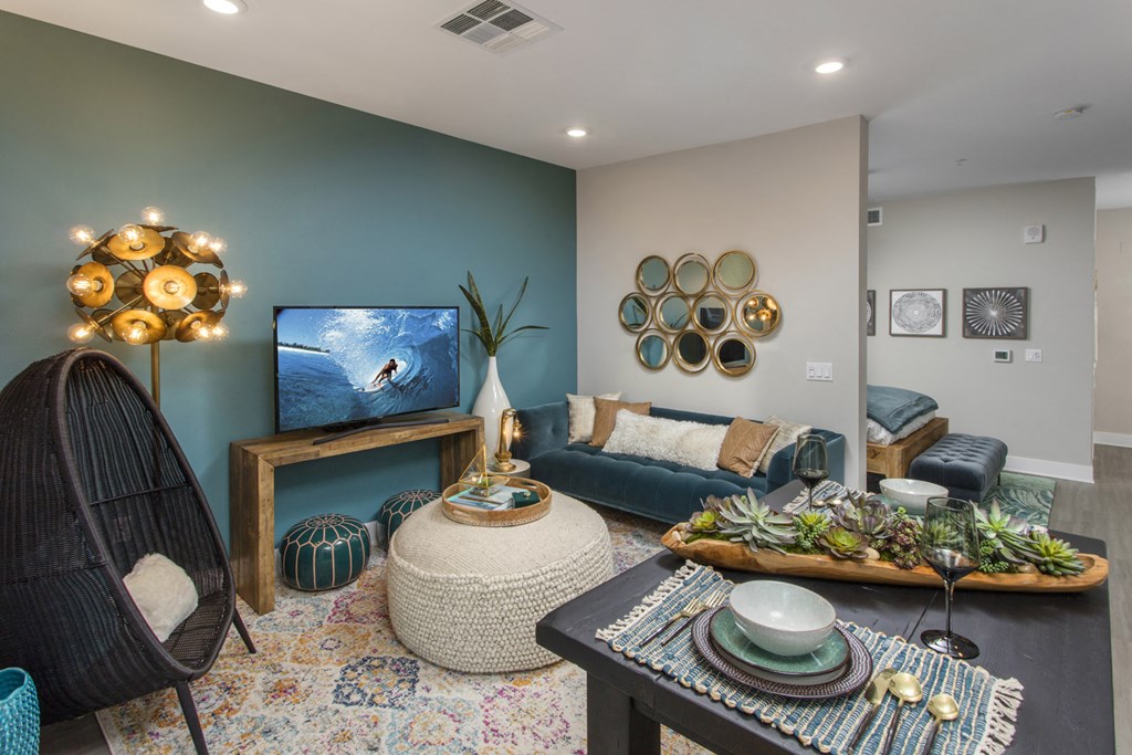 a living room with a couch and a tv