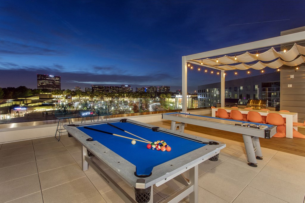 Irvine Apartments for Rent - The Royce - Modern Sky Deck with Lounge Area, City Views, Ping Pong, and Billiards Table