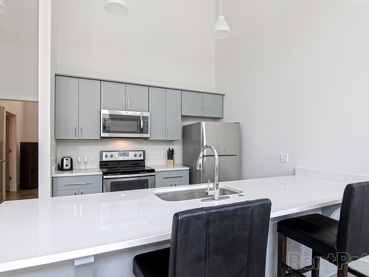 Newly constructed kitchens with stainless steel appliances