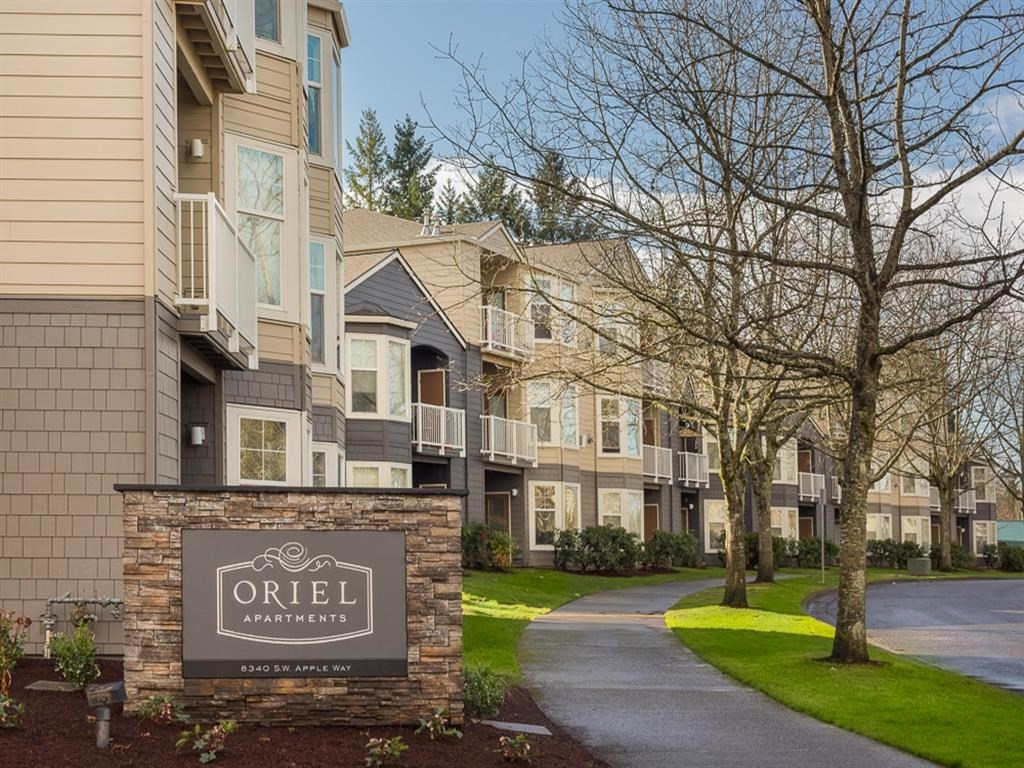 an apartment building with a sign that reads oriel apartments