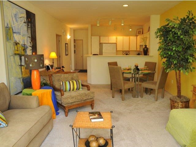 a living room with a couch and a table