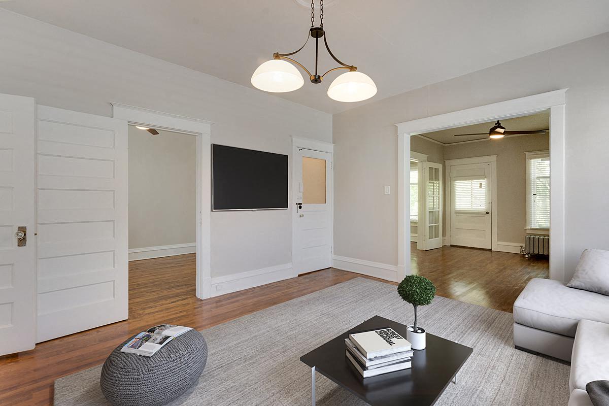a living room with a couch and a table