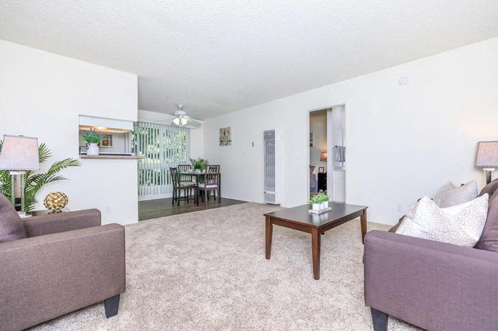 a living room with a couch and a table