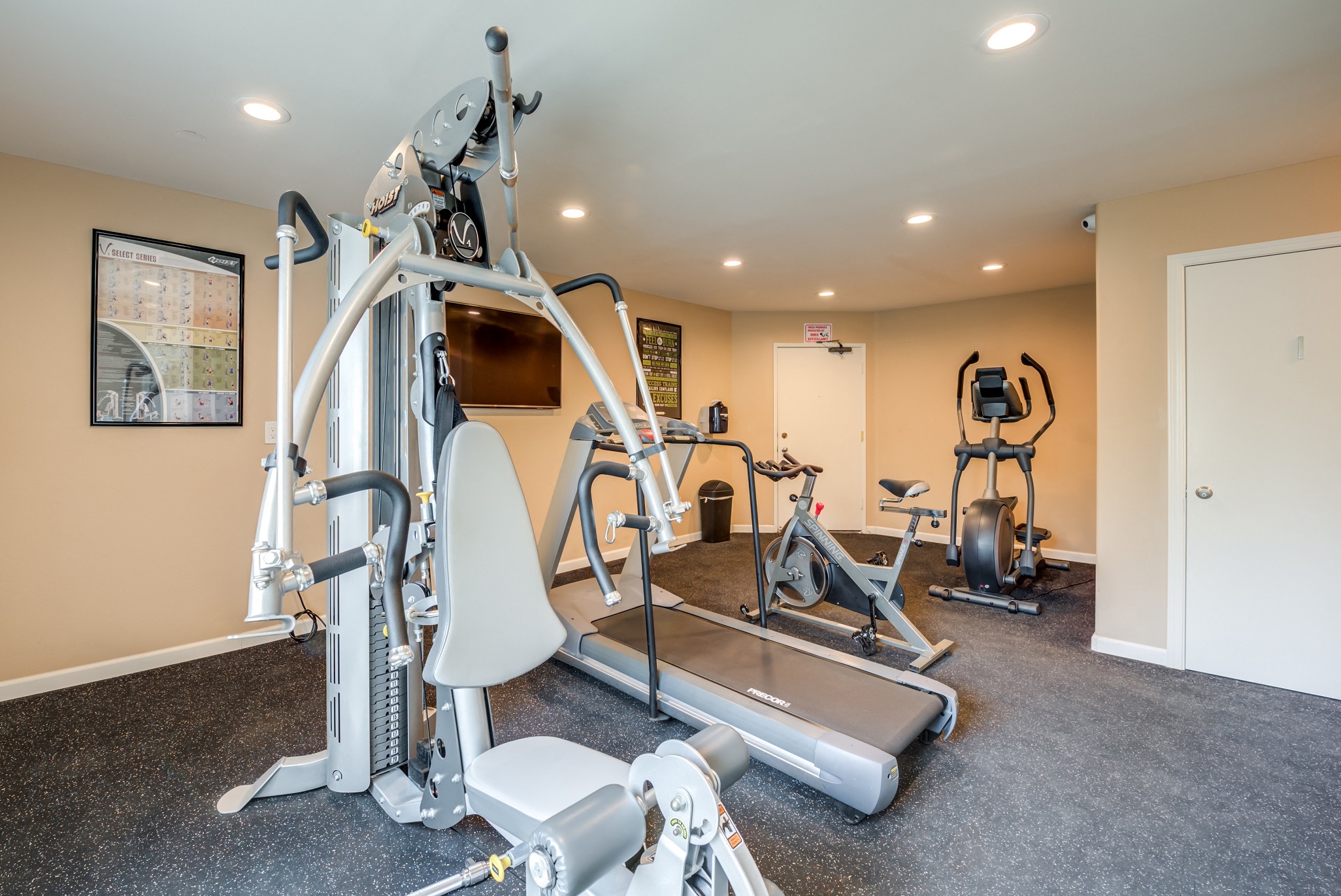 The fitness center at the Diplomat Apartments in Studio City, CA with cardio and workout equipment