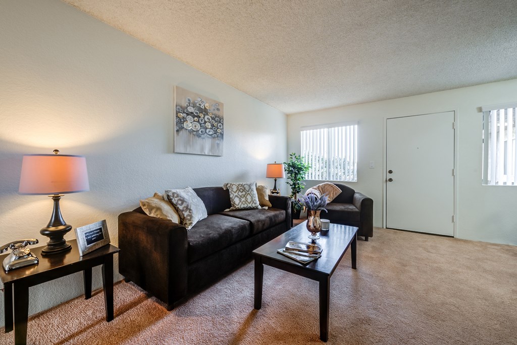 a living room with a couch and a coffee table