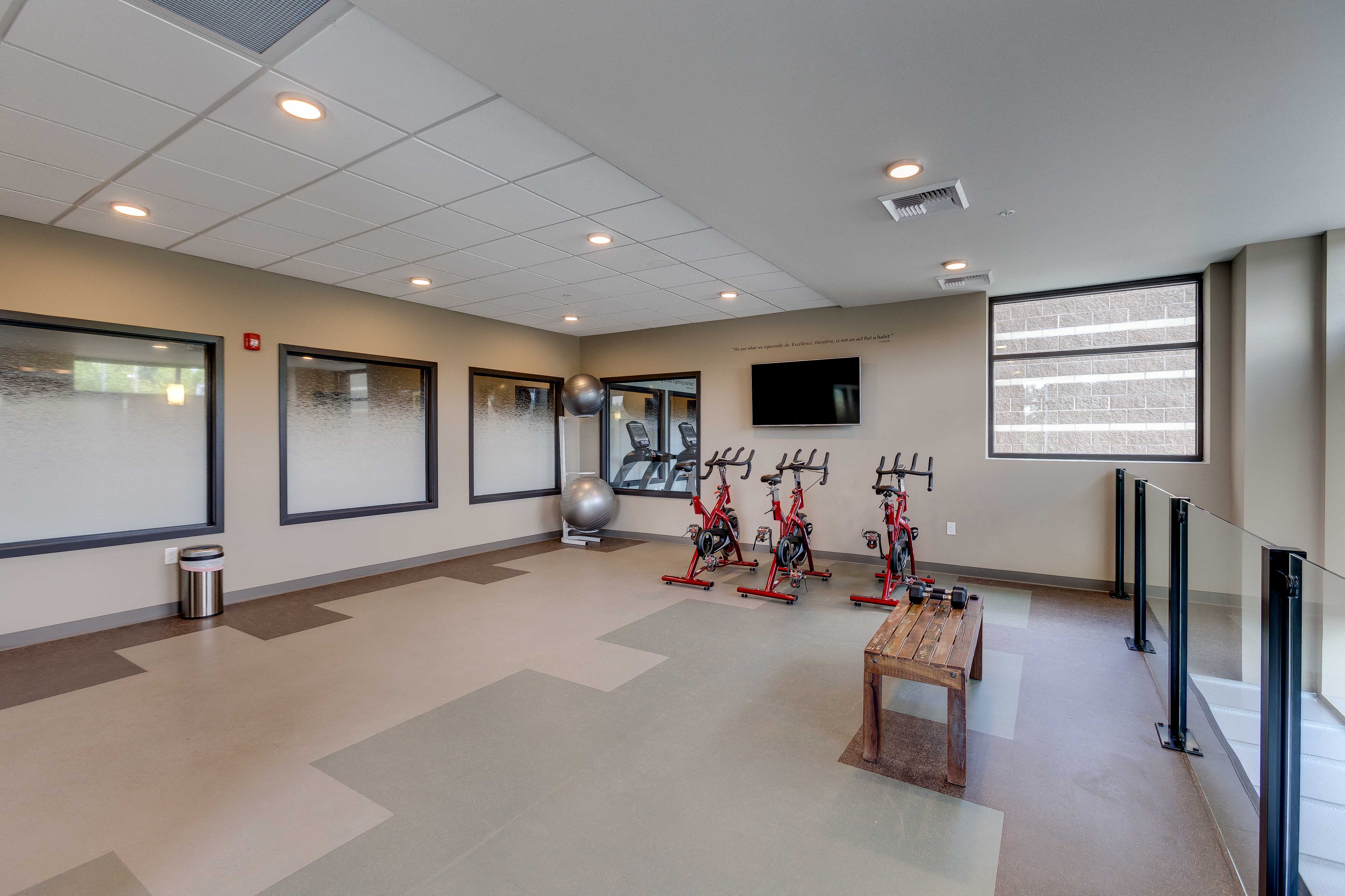 the preserve at cardinal courts fitness room with exercise equipment