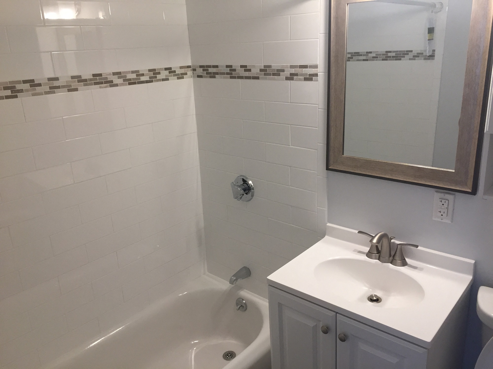 Renovated bathroom with bathtub