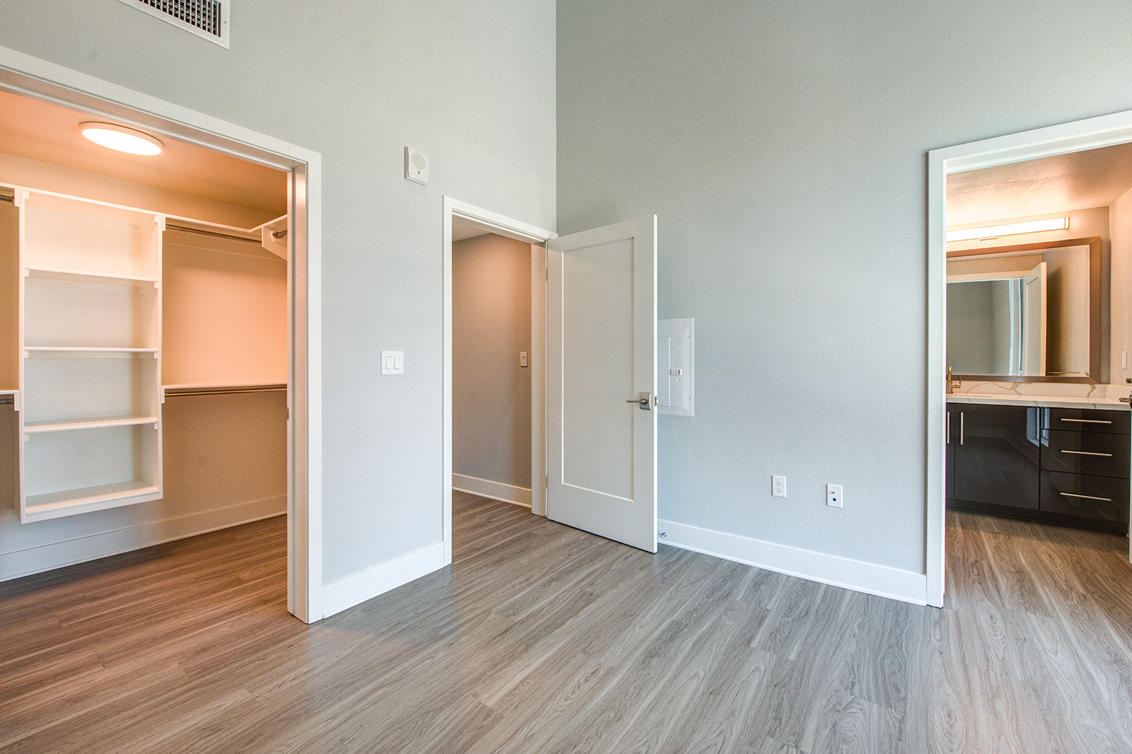 Apartments for Rent in Long Beach-The Linden Apartments Bedroom With Hardwood-Style Flooring, Large Closet, and Bathroom