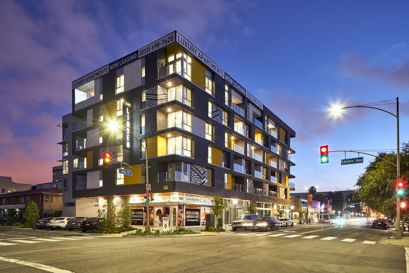 Apartments for Rent in Long Beach CA-The Linden Apartments Street View Of Exterior at Intersection During Sunset