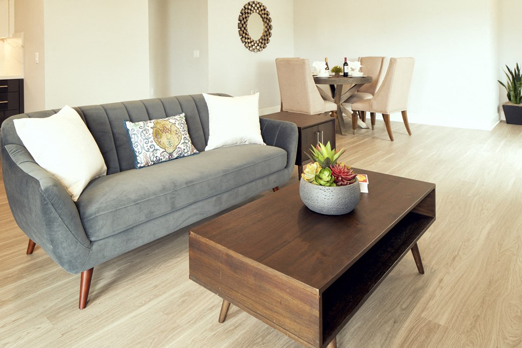a living room with a couch and a coffee table