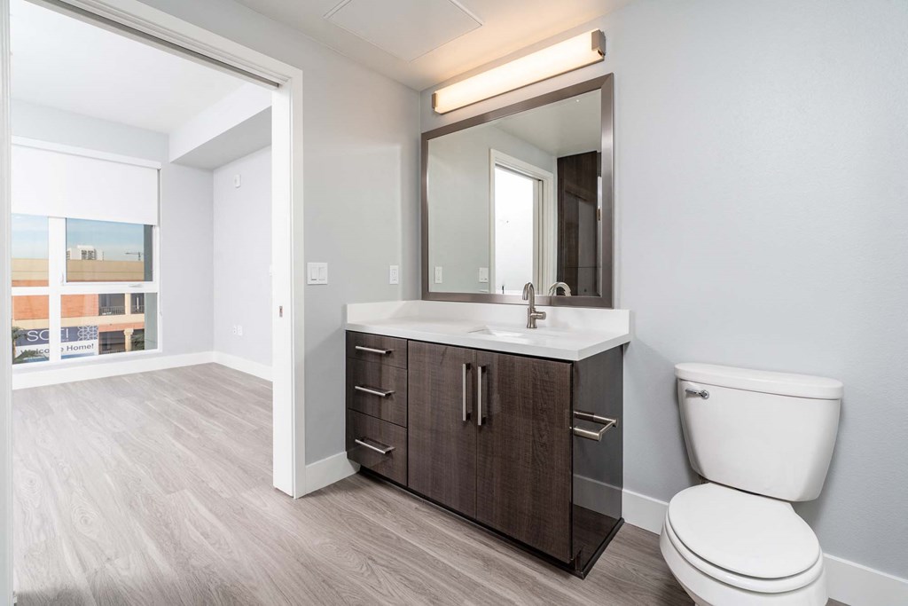 a bathroom with a toilet and a sink