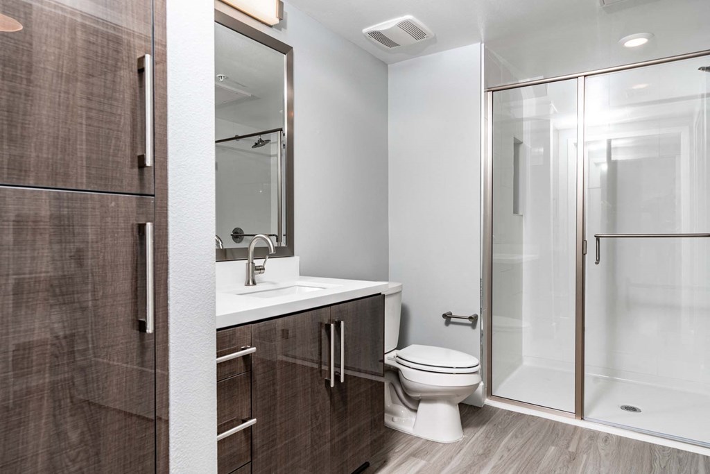 a bathroom with a toilet and a sink