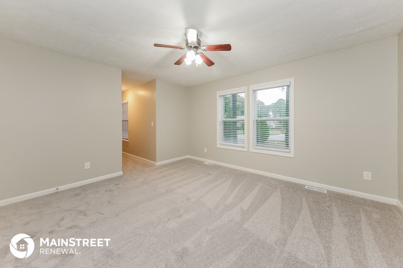 the living room and dining room are spacious and clean