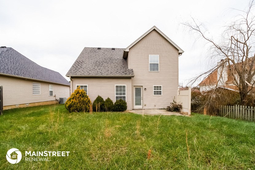 a house with a yard in front of it
